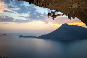 rock climber at sunset with beautiful ocean view